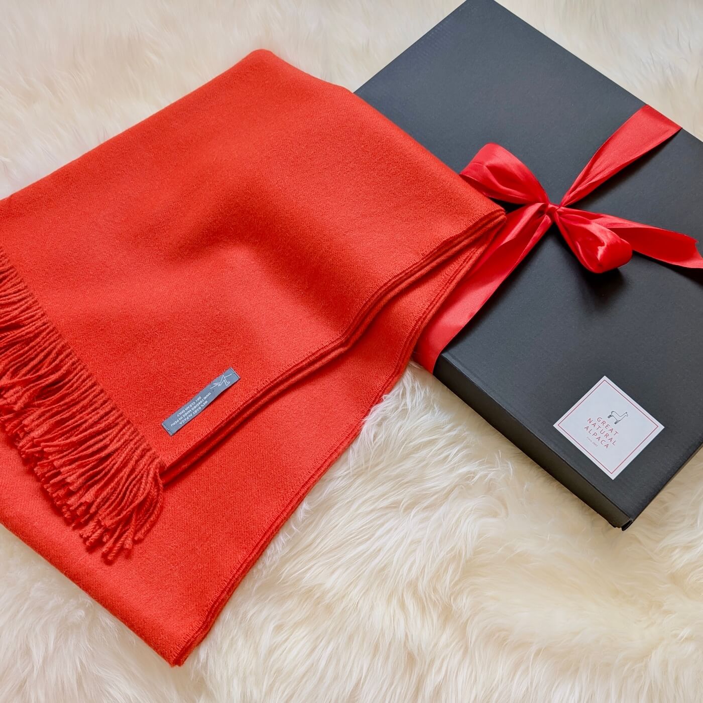 Pătură din lână 100% baby alpaca Supreme, Roșu Melange – ambalată pentru cadou